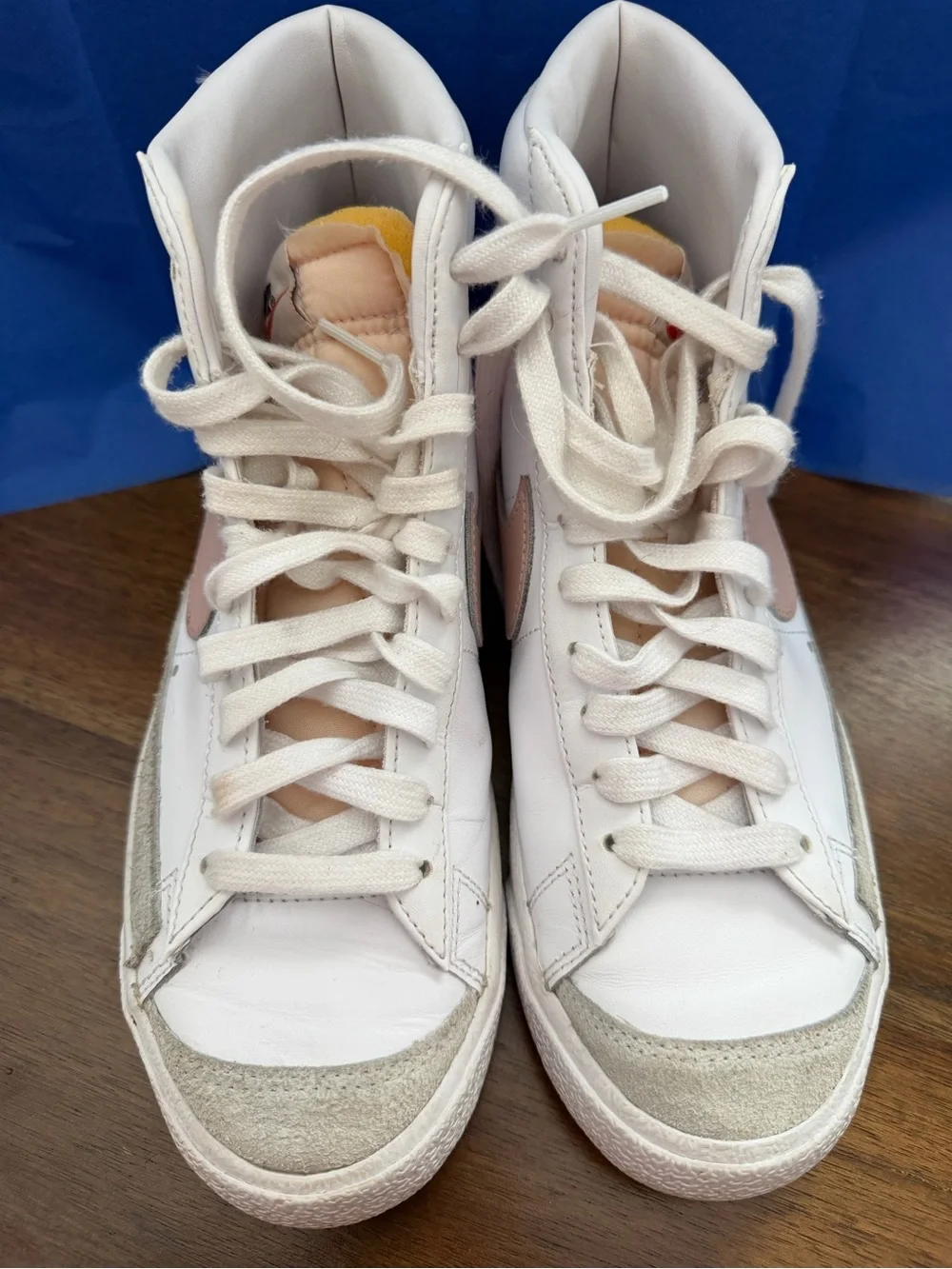 Nike Women's White High-Top Sneakers with Blush Swoosh and Yellow Tongue Accent